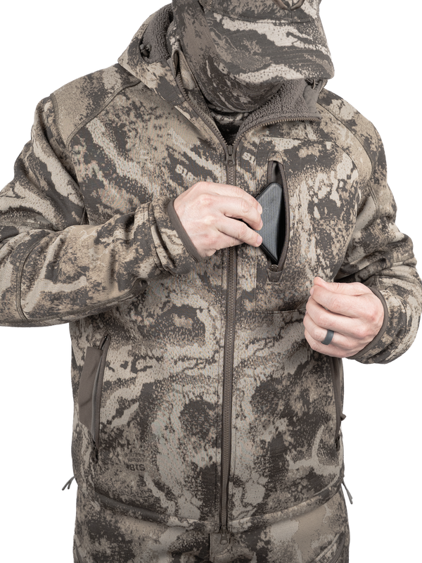 Zippered chest pocket and fleece lined cuff-style entry hand pockets