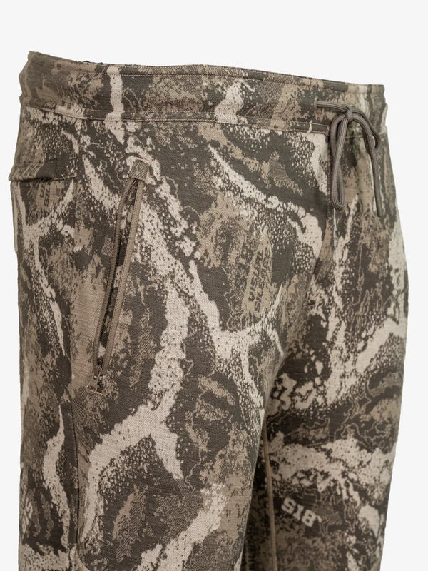 Angled top zippered leg pockets