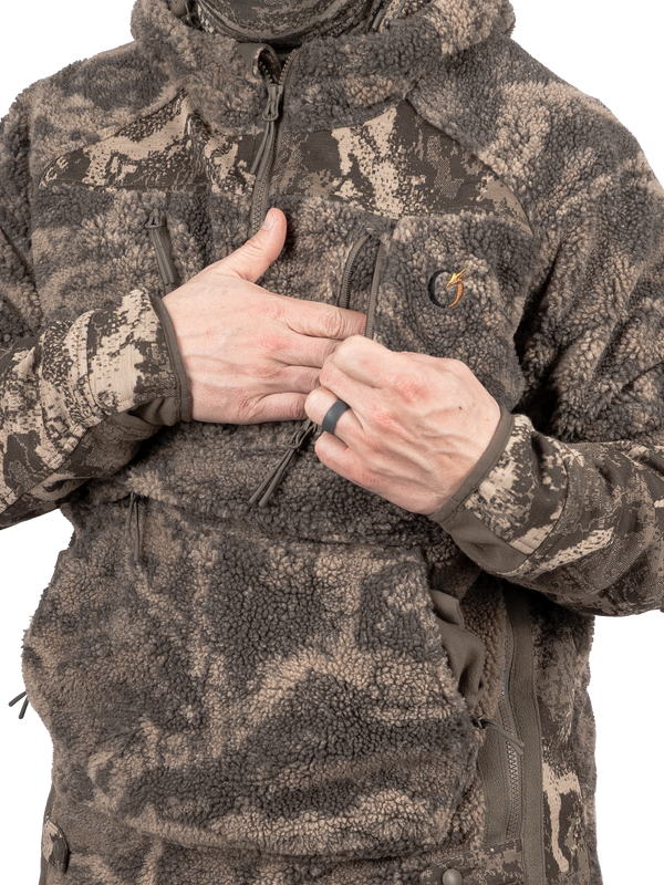 Zippered Napoleon chest pockets for phone and wind tester