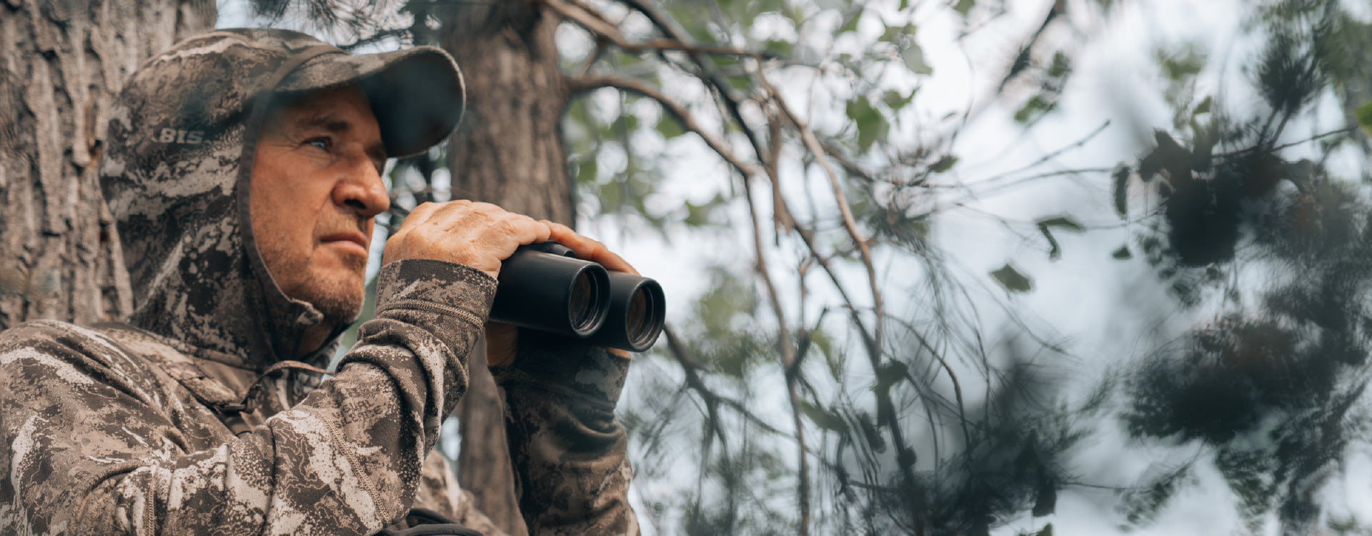 Man holding binoculars