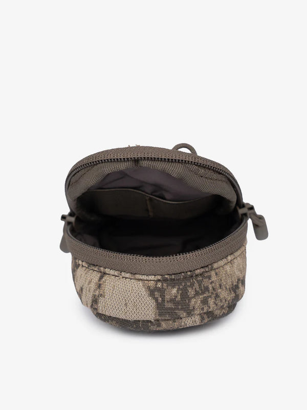 Low-profile YKK® zipper provides smooth, silent operation without snag or sound 