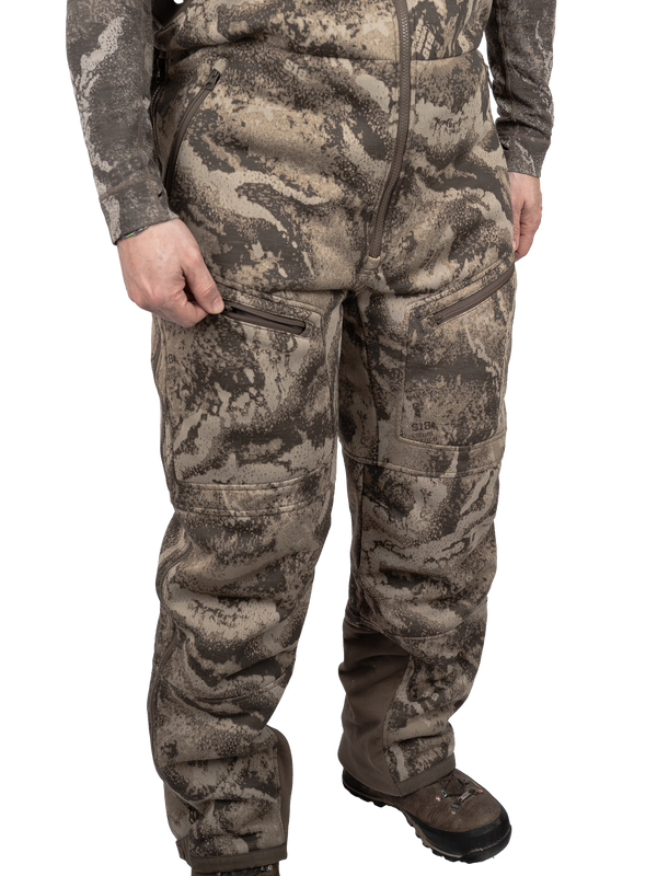 Zippered thigh pockets and side entry hand pockets