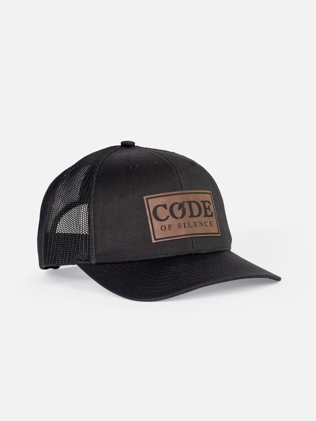 Code of Silence Patch Cap in all black, angled front view showing the leather logo patch