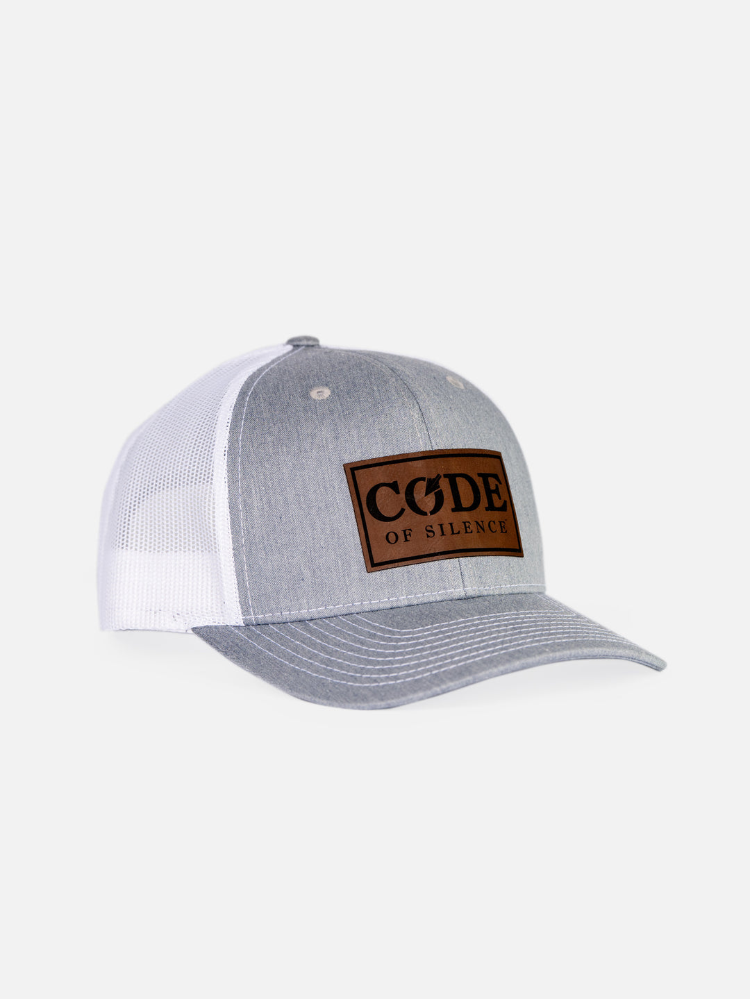 Code of Silence Patch Cap in heather grey with a white mesh back, angled front view showing the leather logo patch